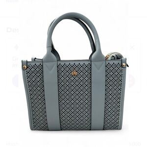 Gloria Vanderbilt blue bag with gold accent could be hand held or crossbody